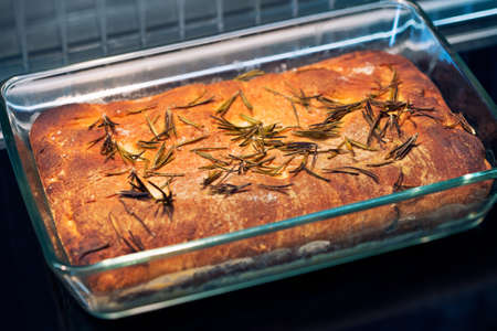 Ciabatta bread with rosemary after bakingの写真素材
