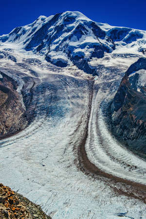 High Alps mountains with glacier at summerの写真素材