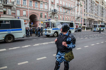 12 June 2017. Russia. Moscow. Tverskaya st. Meeting organized by Alexei Navalny against corruption in  government. Heavy armored police forces holding and prohibit any action of people.のeditorial素材
