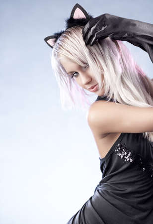 Young fashion woman with kitten style.の写真素材