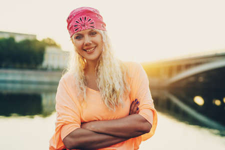 Young teenage style woman sunny portrait at morning sunriseの写真素材