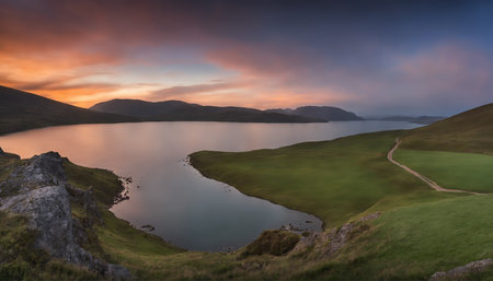 Sunset over lake and highlands.の素材