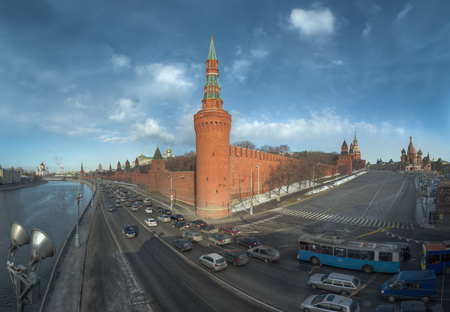 Moscow Kremlin at early spring day. View from corner of outer wall, with busy traffic on street along the river.の写真素材