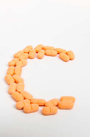 citrus pill in sclices forming a C for Vitamin Cの写真素材