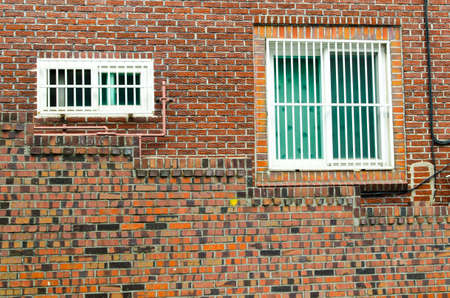 vintage brick wall background with old window