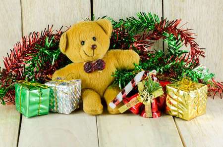 Seated teddy bear with giftの写真素材