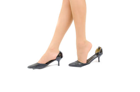 Woman legs with high heels.