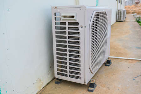 air compressor with on the wall outdoorの写真素材