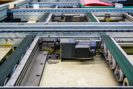 Electric motor and conveyor belt in factoryの写真素材