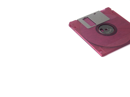 Fuchsia pink floppy disk or diskette isolated on white background, floppy disk is magnetic computer...