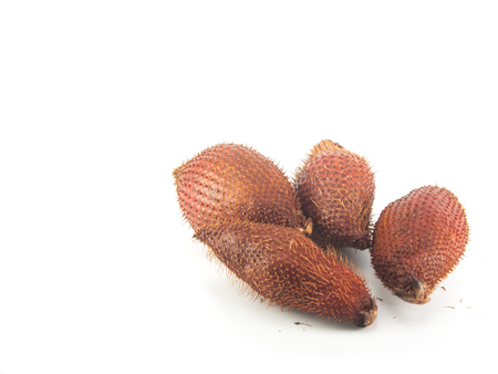 Salacca fruit on the white background,Salak fruit have many thorn on skinの写真素材