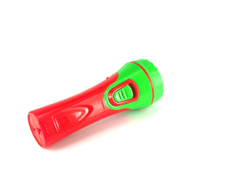 electric red and green flashlight isolated on white backgroundの写真素材