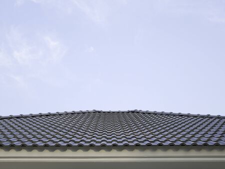 blue sky and blue roof house.modern roof homeの写真素材