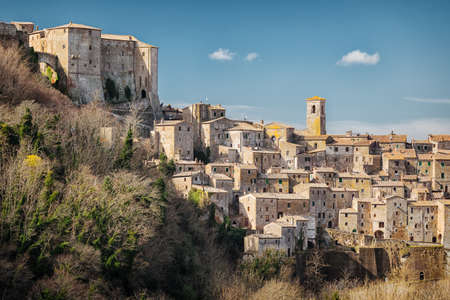 Pitigliano medieval town on tuff rocky hill. Panorama landscape. Italy, Europe.の写真素材