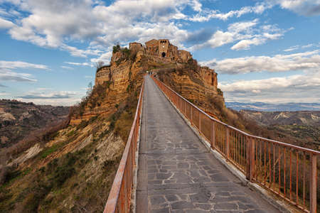 Beautiful view of famous Civita di Bagnoregio with Tiber river valley, Lazio, Italyの写真素材