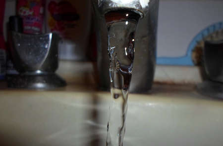 Canilla with water, high speed imageの写真素材