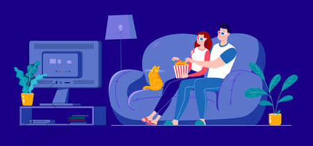 A married couple is watching a 3D movie on a large screen, sitting on a sofa at home in a dark room. Self-isolation at home.の写真素材