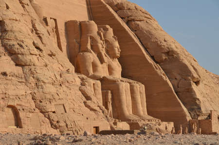 Sculpture of Colossi of Pharaoh Ramses II on temple of Abu Simbel