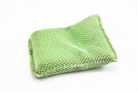 Green sponge isolated on white の写真素材