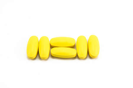 pill yellow isolatedの写真素材