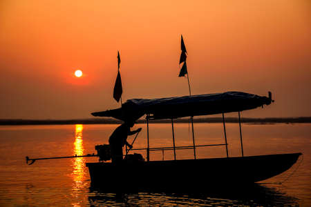 Ships sunset silhouetteの写真素材