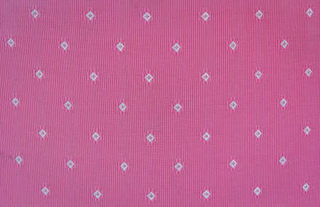 Closeup detail of pink fabric texture background