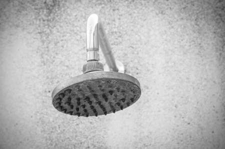 close up on head shower while running waterの写真素材