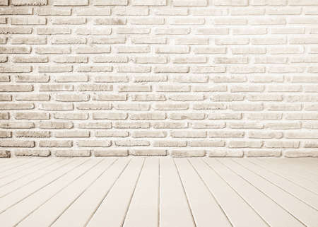 interior of white brick wall with white wooden floor.の写真素材