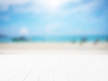 White wood floor with blurred sea background.の写真素材