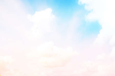 The blur pastels gradient sunset background on soft nature sunrise peaceful morning beach outdoor. heavenly mind view at a resort deck touching sunshine, sky summer clouds.の写真素材