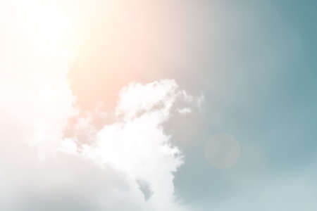 Sunshine clouds sky during morning background. Blue,white pastel heaven,soft focus lens flare sunlight. Abstract blurred cyan gradient of peaceful nature. Open view out windows beautiful summer springの写真素材