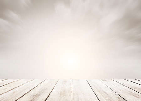 Wood tabletop foreground with sunshine clouds sky during morning background. Blue,white pastel...