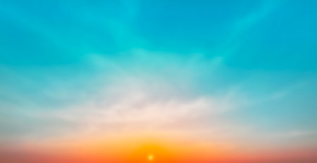 Blur pastels gradient sunset background on soft nature sunrise peaceful morning beach outdoor. heavenly mind view at a resort deck touching sunshine, sky summer clouds.の写真素材