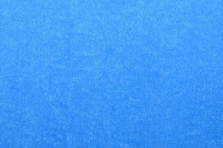 Blue natural plush terry cloth bath towel, macro background closeup の写真素材