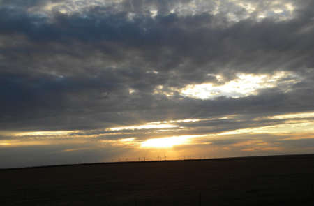 windmills on the horizonの写真素材