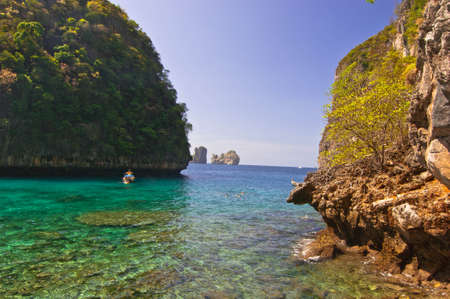 Green sea between islandの写真素材