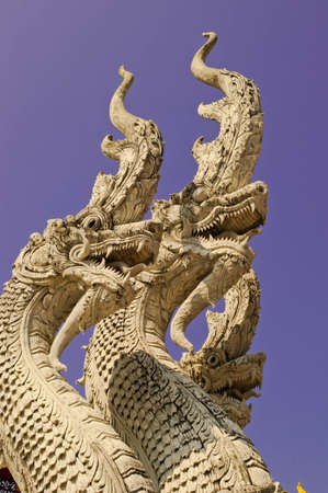Three heads of serpent mold at the front of buddha temple
