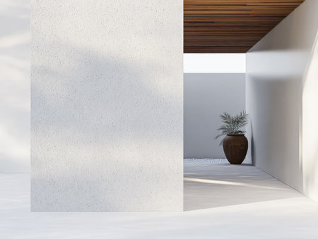 This scene showcases a contemporary outdoor area with a smooth white wall and wooden ceiling. A simple potted plant adds a touch of nature while sunlight streams in.の素材