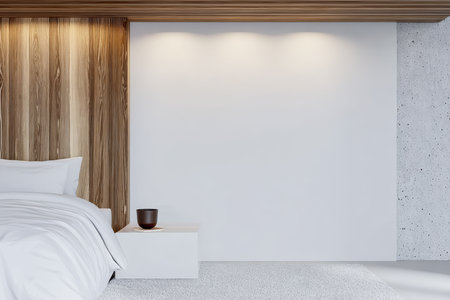 This modern bedroom showcases a wooden accent wall, a neatly made bed with crisp white linens, and a minimalist aesthetic. Soft light enhances the serene atmosphere.の素材