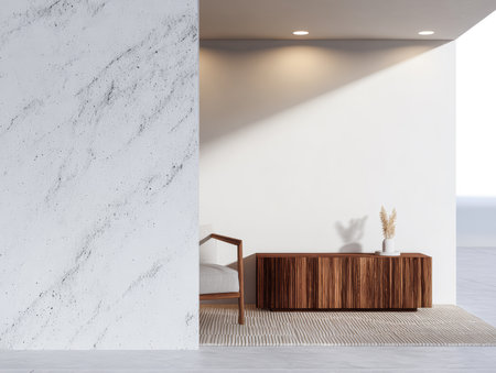 A contemporary living area showcases a sleek wooden cabinet and a comfortable chair against a minimalist wall, enhanced by natural light and soft textures.の素材