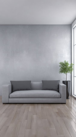 A stylish gray sofa features prominently in a minimalistic living room. Bright natural light floods the space through large windows, adding warmth to the modern design.の素材