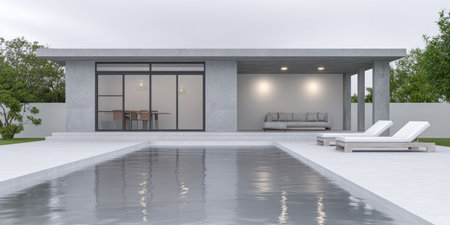 A sleek concrete house features large windows, a swimming pool, and lounge chairs on a sunny day. Lush greenery surrounds the modern home, providing a serene atmosphere.の素材
