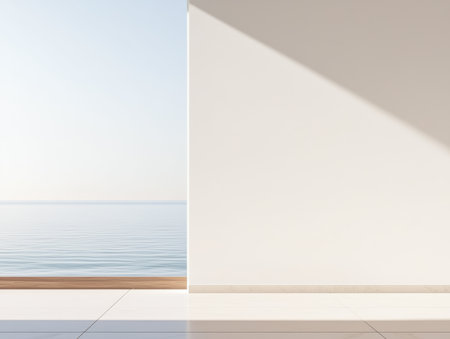 Bright, modern room features a white wall and wooden floor, allowing a serene view of calm waters during the daytime. The balcony invites peaceful moments by the sea.の素材