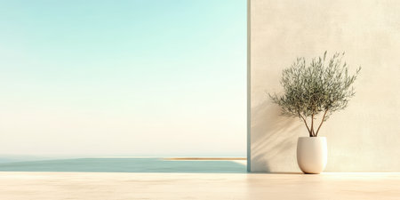 A simple coastal view features a single plant in a white pot positioned near a light-colored wall. The tranquil ocean can be seen in the distance under a clear sky.の素材