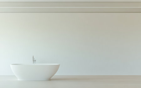 A modern bathroom showcases a clean and minimalist aesthetic with a smooth freestanding bathtub positioned against a plain white wall, highlighting tranquility and simplicity.の素材