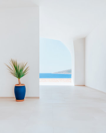Bright, minimalist interior design features a blue pot with a green plant. Large windows reveal a stunning view of the ocean on a clear day.の素材