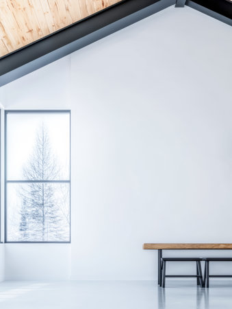 A spacious, minimalist room features a large window that reveals a serene winter scene with a snow-covered tree. Light pours in, highlighting the simple design.の素材