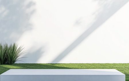 This outdoor area features a simple white structure, surrounded by green grass and plants. Soft shadows create a peaceful ambiance, ideal for relaxation or gatherings.の素材