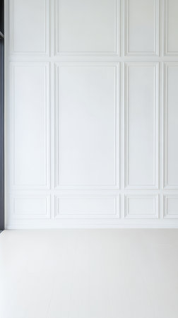A spacious room features pristine white walls with a simple panel design and a smooth floor, making it ideal for artistic projects or gatherings.の素材
