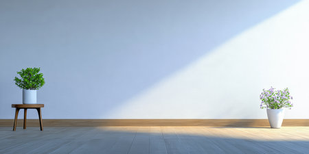 A minimal room features two potted plants on the floor, one on a small wooden table and another beside it. Sunlight creates a warm atmosphere, highlighting the simplicity.の素材